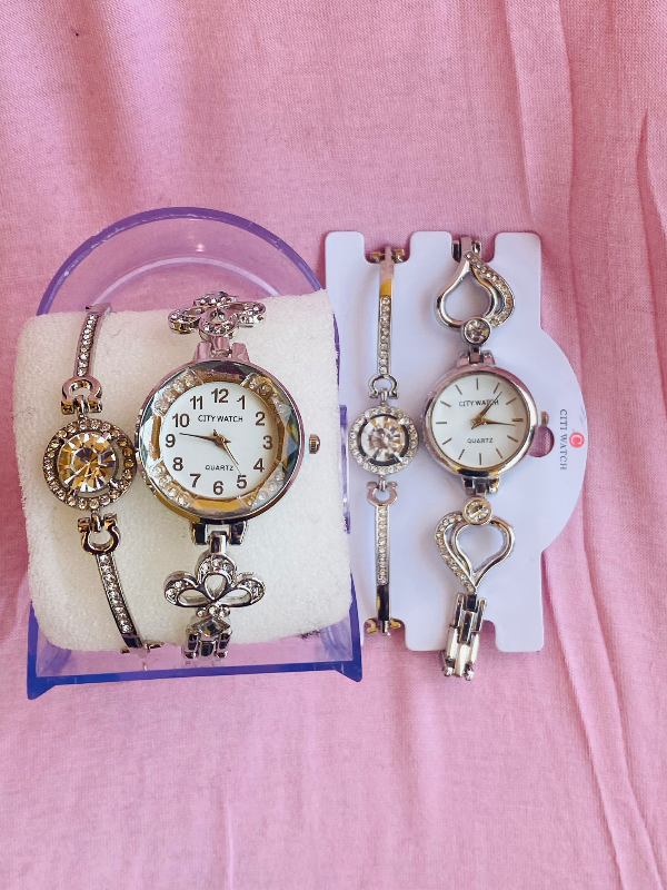 Silver watch and it’s bracelet 